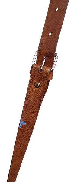 Strap of a vintage 1960s Mexican tooled-leather crossbody bag constructed as a miniature Western horse saddle.