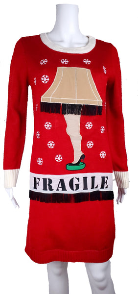 A Christmas Story red light-up sweater dress with dimensional leg lamp appliqué, snowflakes and FRAGILE fringe panel