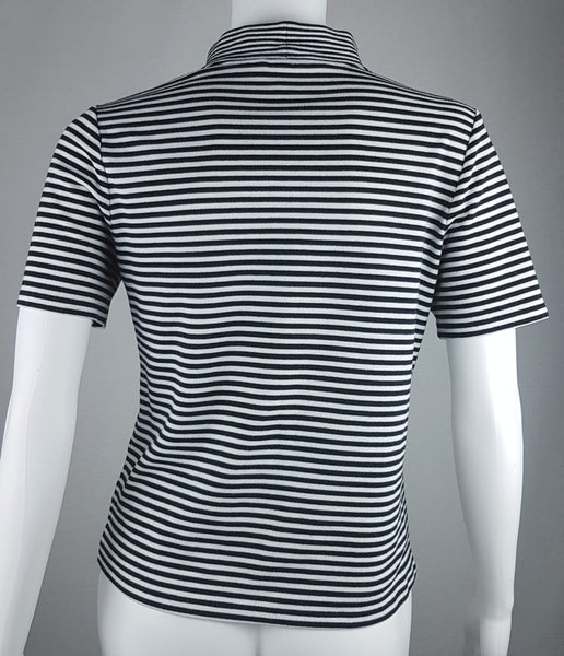 Full back view of an Alia black and white striped knit top with short sleeves, a mock neckline and a softly fitted silhouette.