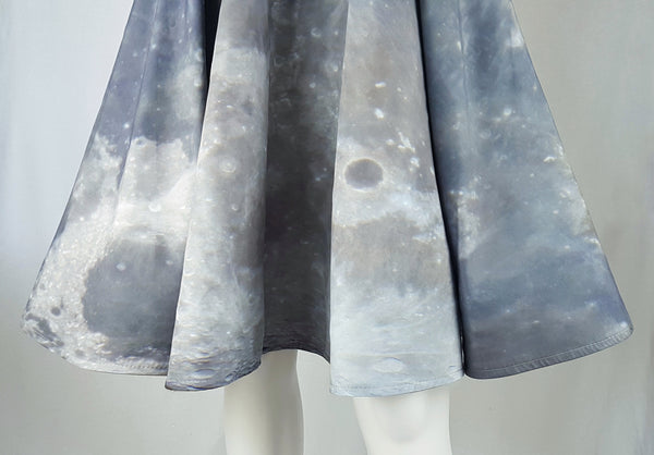Full bottom hem view of BG Design Canada Moon Print Circle Skirt from Fall 2016 Collection displayed on a mannequin