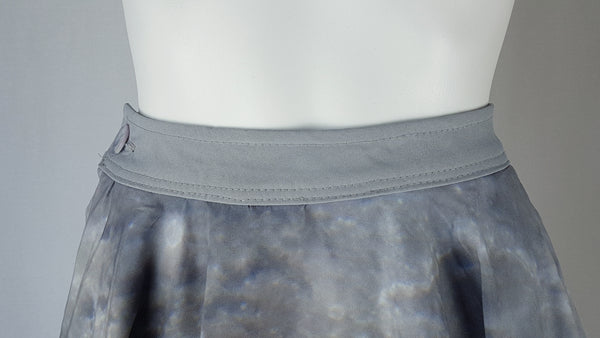 Close up of back waistband view of BG Design Canada Moon Print Circle Skirt from Fall 2016 Collection displayed on a mannequin