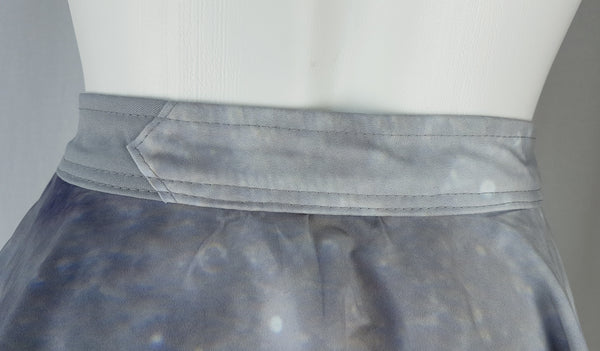 Close-up of the overlapping grey waistband construction on BG Design Canada Moon Print Circle Skirt from Fall 2016 Collection 