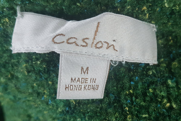 Close-up of Caslon cardigan label showing size Medium
