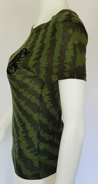 Side view Green and black patterned “LOVE” T-shirt top from Gwen Stefani’s Fall 2005 L.A.M.B. collection, with an ornate black chest motif.