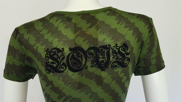 Back view Green and black patterned “LOVE” T-shirt top from Gwen Stefani’s Fall 2005 L.A.M.B. collection, with an ornate black chest motif.