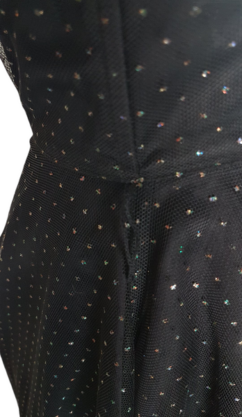 closeup of fabric detail - A vintage 1980's Gunne Sax black formal dress with a pleated tulle sweetheart neckline and multicolor glitter dots, featuring a fitted bodice and full sweep skirt with a built-in crinoline.