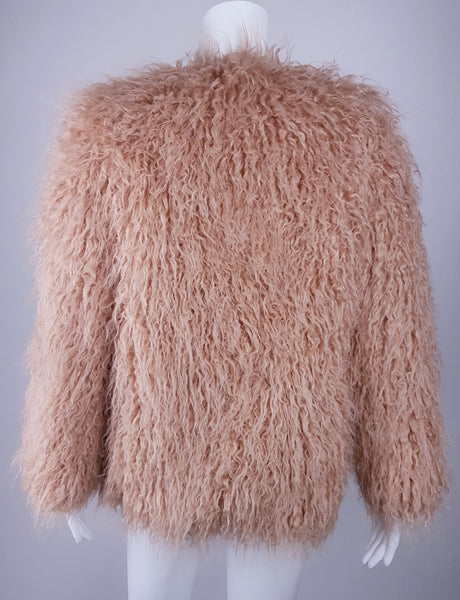  full back view of a H&M dusty rose shaggy faux-fur jacket displayed on a mannequin