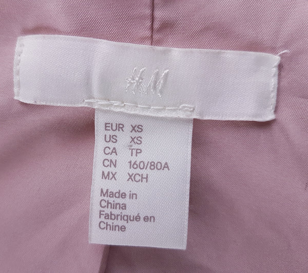 H&M Extra Small label inside dusty rose faux-fur jacket