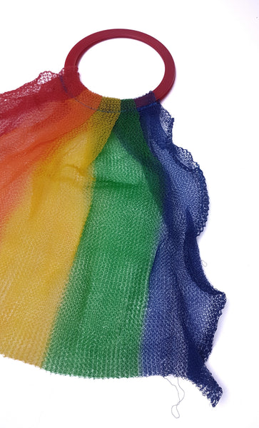 Close-up of the open-weave striped mesh showing the small snag near the bottom of the bag