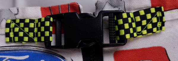 Close-up of the black side-release buckle and yellow-and-black checkerboard webbing belt