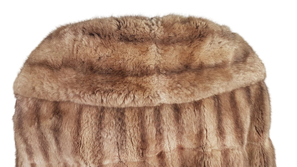 Closer back view of a vintage 1950s Hudson’s Bay Company mink jacket showing its generous curved collar, silhouette and warm tan and taupe colour variation.