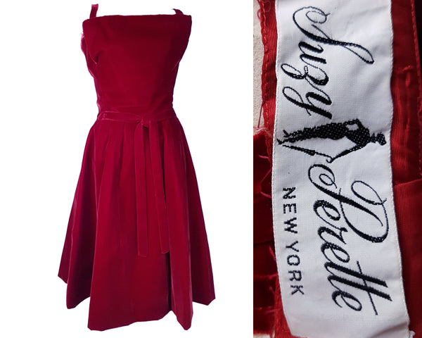 Front view and label view of a circa mid-1950s Suzy Perette dark red velvet dress with fitted bodice, pleated skirt and velvet waist ties displayed on a mannequin 
