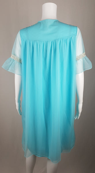 Vintage 1960's Canadian Maid Azure Blue Gathered Yoke Robe with silver and white decorative details on bust and sheer sleeves displayed on a mannequin - back view