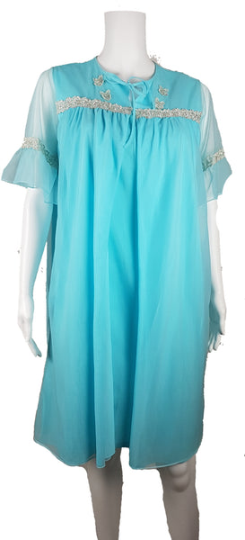 Vintage 1960's Azure Blue Sylvia Ann Peignoir Slip and Canadian Maid Gathered Yoke Robe Lingerie Set with silver and white decorative details on bust displayed on a mannequin - front view