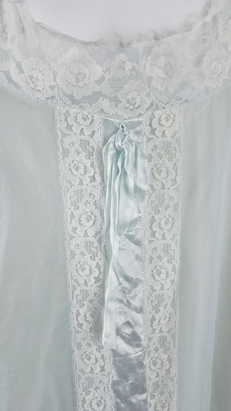 Vintage 1960s Aristocraft by Superior pastel blue peignoir and nightgown set with cream floral lace and ribbon ties displayed on a mannequin - ribbon and lace details