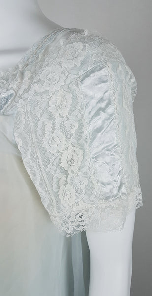 Vintage 1960s Aristocraft by Superior pastel blue peignoir and nightgown set with cream floral lace and ribbon ties displayed on a mannequin - shoulder lace details