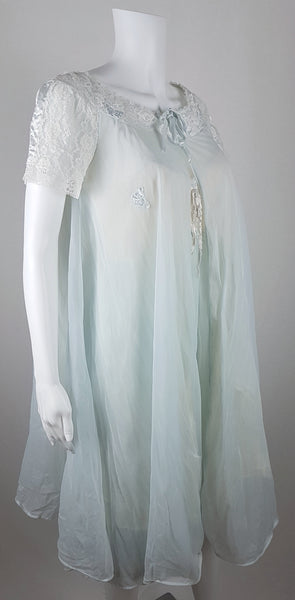 Vintage 1960s Aristocraft by Superior pastel blue peignoir and nightgown set with cream floral lace and ribbon ties displayed on a mannequin - side view