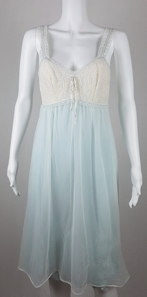 Vintage 1960s Aristocraft by Superior pastel blue nightgown with cream floral lace and ribbon ties displayed on a mannequin - front view