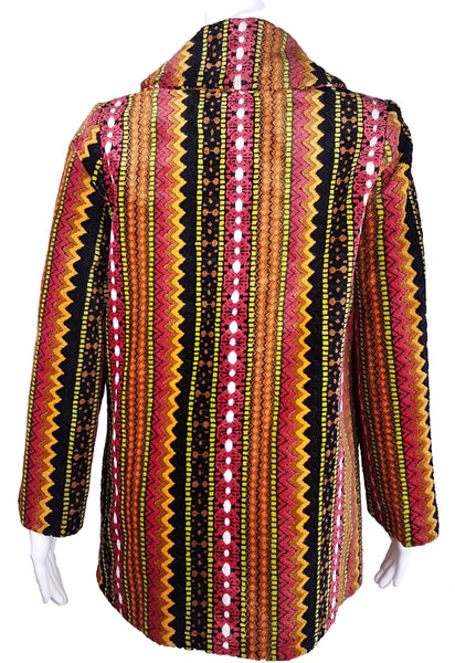 Full back view of a vintage 1960s Trego’s Westwear chenille coat with a fully buttoned funnel collar, colourful geometric stripes and angled pockets displayed on a mannequin 