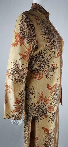 Close up of three quarter view of Vintage 1970s Alfred Shaheen Gold Metallic Floral Maxi Dress & Jacket Set displayed on a mannequin
