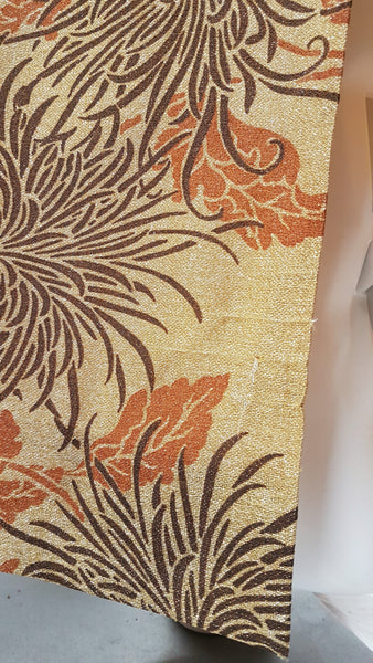 Condition close-up showing a minor loose thread in the metallic knit near the lower rear of the dress.
