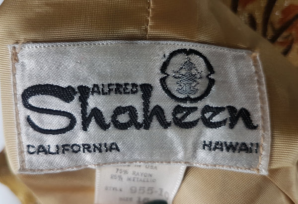 Close-up of the Alfred Shaheen California Hawaii woven designer label.