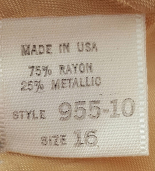 Close-up of the garment label marked Made in USA, 75% rayon, 25% metallic, style 955.10 and size 16.