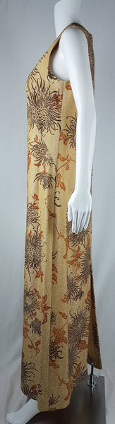 Full side view of Vintage 1970s Alfred Shaheen Gold Metallic Floral Maxi Dress displayed on a mannequin