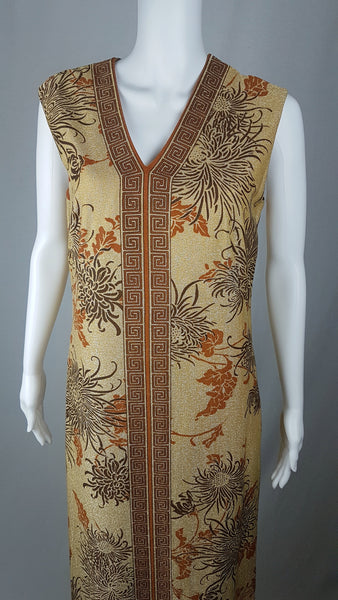 Full side view of Vintage 1970s Alfred Shaheen Gold Metallic Floral Maxi Dress displayed on a mannequin