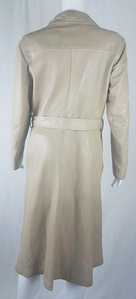 Back view of a vintage 1970s sand-coloured leather trench coat with tonal buttons, shoulder tabs and a matching belt displayed on a mannequin