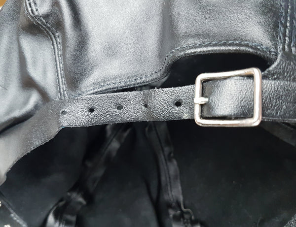 Close-up of the rear buckle strap with multiple adjustment holes