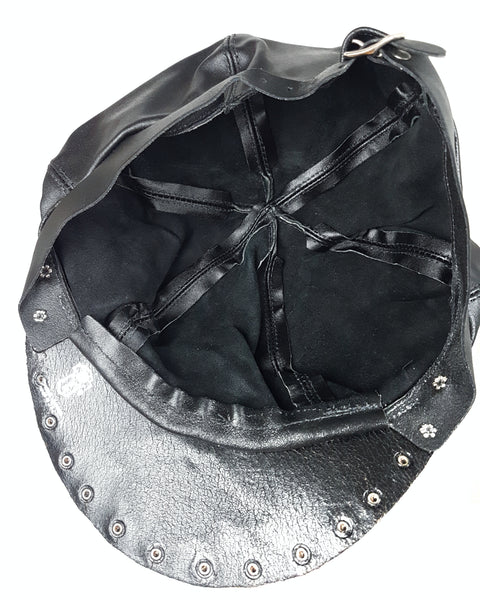 Interior view showing the underside of the studded peak, support bands and adjustable rear strap