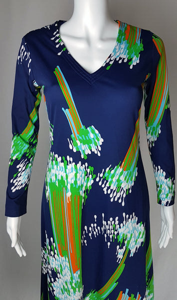 Closer front view of a vintage 1970s Lanvin maxi dress showing its topstitched V-neckline and cascading abstract print.
