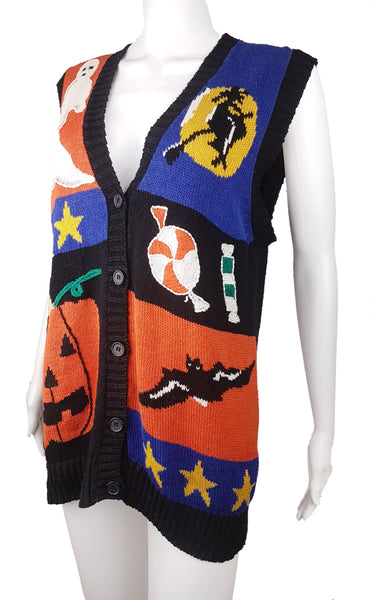 Full three quarter view of vintage  1980s–1990s Laura Gayle Halloween cardigan vest with colourful ghost, witch, pumpkin, bat and candy motifs