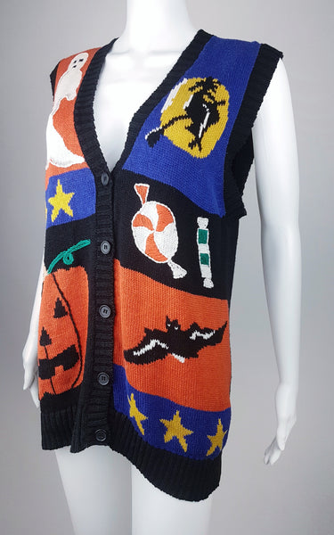 Full three quarter view of vintage  1980s–1990s Laura Gayle Halloween cardigan vest with colourful ghost, witch, pumpkin, bat and candy motifs