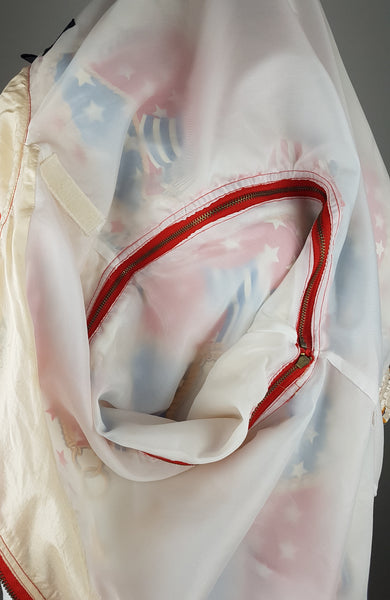 Closeup of detachable inner sleeve zipper view of a Vintage 1980s - 1990s Mureli silk bomber jacket 