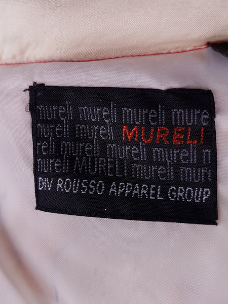 Closeup view of label on a Vintage 1980s - 1990s Mureli silk bomber jacket 