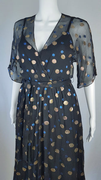 Full front view of a Vintage 1980s Edith Strauss Black Silk Metallic Polka-Dot Midi Dress displayed on a mannequin