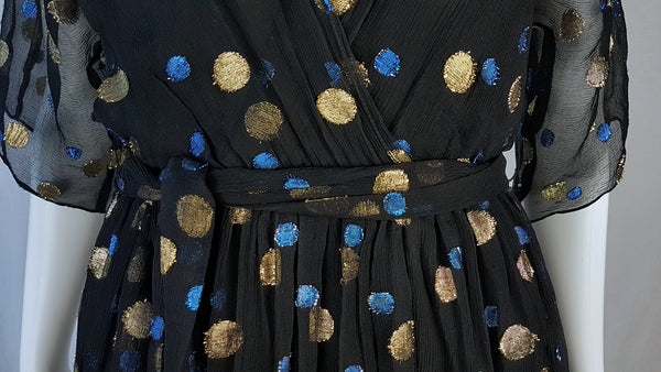 Close-up of the elasticated front waist and matching tie belt on a Vintage 1980s Edith Strauss Black Silk Metallic Polka-Dot Midi Dress displayed on a mannequin