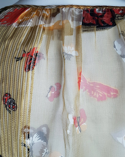 Alternate interior neckline view showing the Soo Yung Lee label, finished upper edge and metallic-striped silk construction.