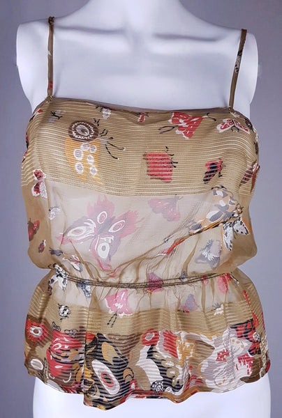Full front view of a vintage 1980s Soo Yung Lee silk camisole with narrow straps, a straight neckline and a short flared peplum hem.