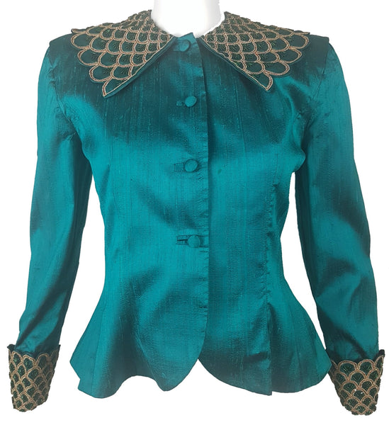 Full front view of a vintage 1980s Spaghetti London teal silk evening jacket with a beaded statement collar and deep embellished cuffs.