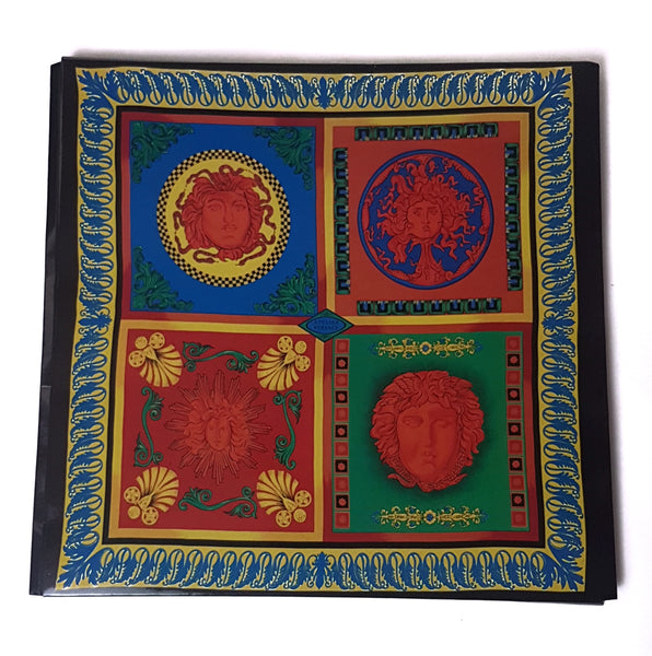 Front view of Original illustrated vintage 1990s Atelier Versace presentation folder featuring four colorful neoclassical panels and the Atelier Versace name.