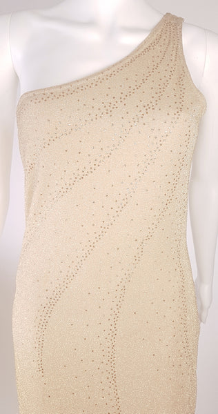 Front view of a vintage 1990s LA Glo gold lurex evening gown, showing its one-shoulder neckline and and radiating glitter-dot embellishment