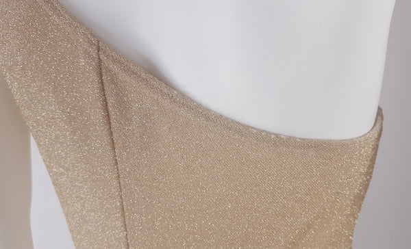 closeup back view of a vintage 1990s LA Glo gold one-shoulder maxi gown with a fitted bodice