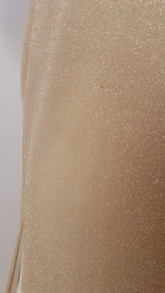 closeup fabric view of a vintage 1990s LA Glo gold lurex evening gown