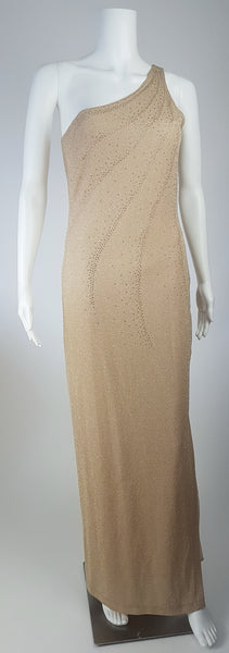 Full front view of a vintage 1990s LA Glo champagne-gold lurex one-shoulder evening gown with a fitted floor-length column silhouette displayed on a mannequin