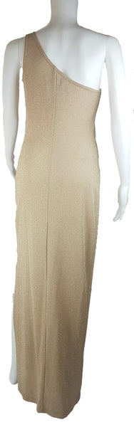 Full back view of a vintage 1990s LA Glo champagne-gold lurex one-shoulder evening gown with a fitted floor-length column silhouette displayed on a mannequin