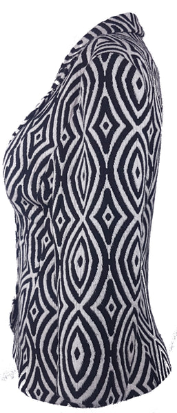 Full side view of a vintage 1990s Le Château black-and-white op-art jacket with notched lapels and a three-button closure displayed on a mannequin