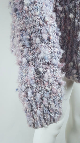 Close-up of the full-length sleeve and softly rounded cuff on Vintage 1990s Pastel Popcorn-Knit Open-Front Cardigan 